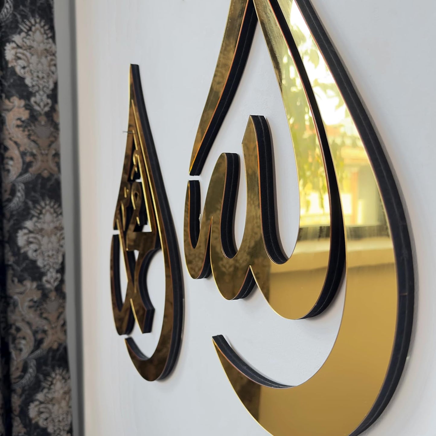 مجموعة من قطعتين: الله ومحمد في شكل قطرة