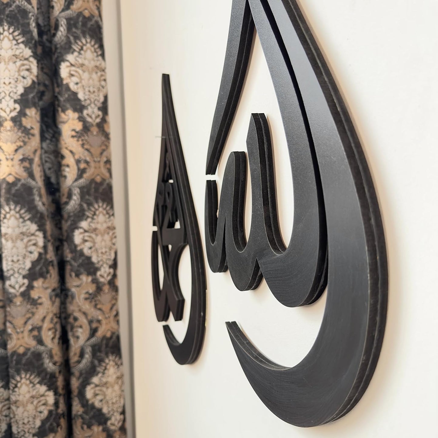 مجموعة من قطعتين: الله ومحمد في شكل قطرة